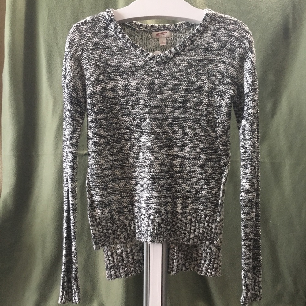 Black/White Sweater with slit half way up. Size M